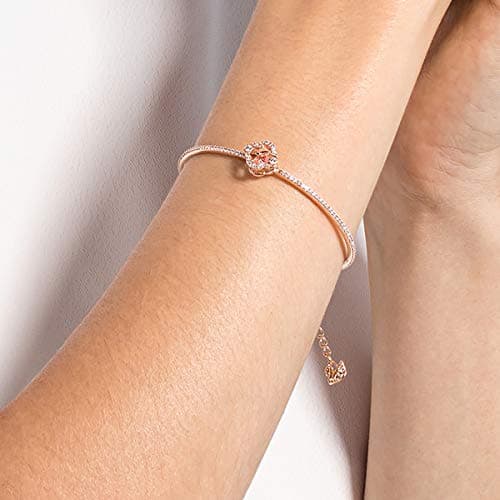 Swarovski Una Clover Bangle Bracelet for Women with a Pink Crystal Surrounded by White Crystal Pavé on a Rose-Gold Tone