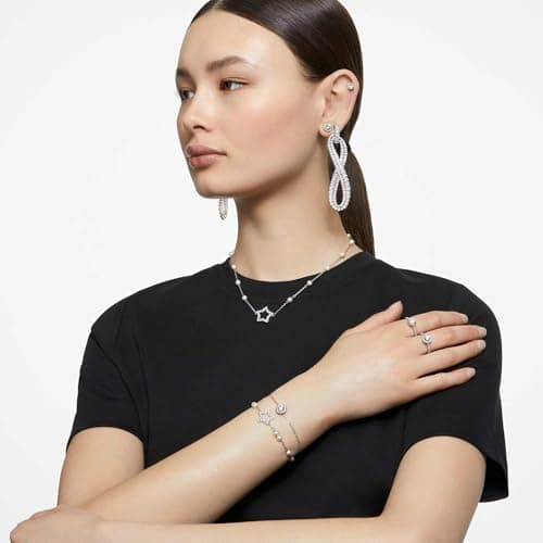Swarovski Constella Pierced Stud Earrings for Women Casual Daily Wear Sparkling Brass Earrings
| Swarovski Constella Pi
